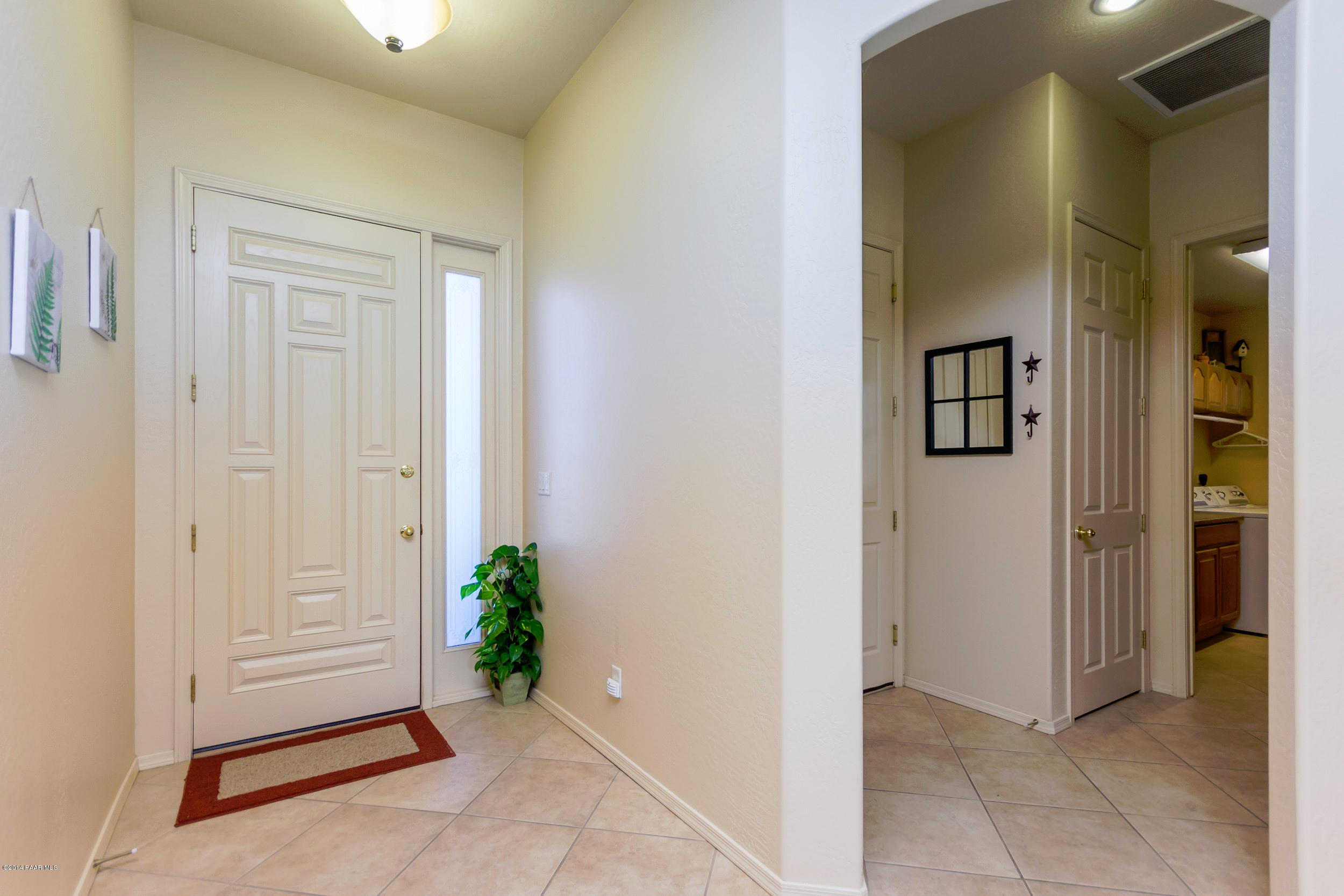 4714 Edgemont Road Prescott Valley, AZ 86314 - Photo 5 of 30 a view of a hallway with closet and a bathroom