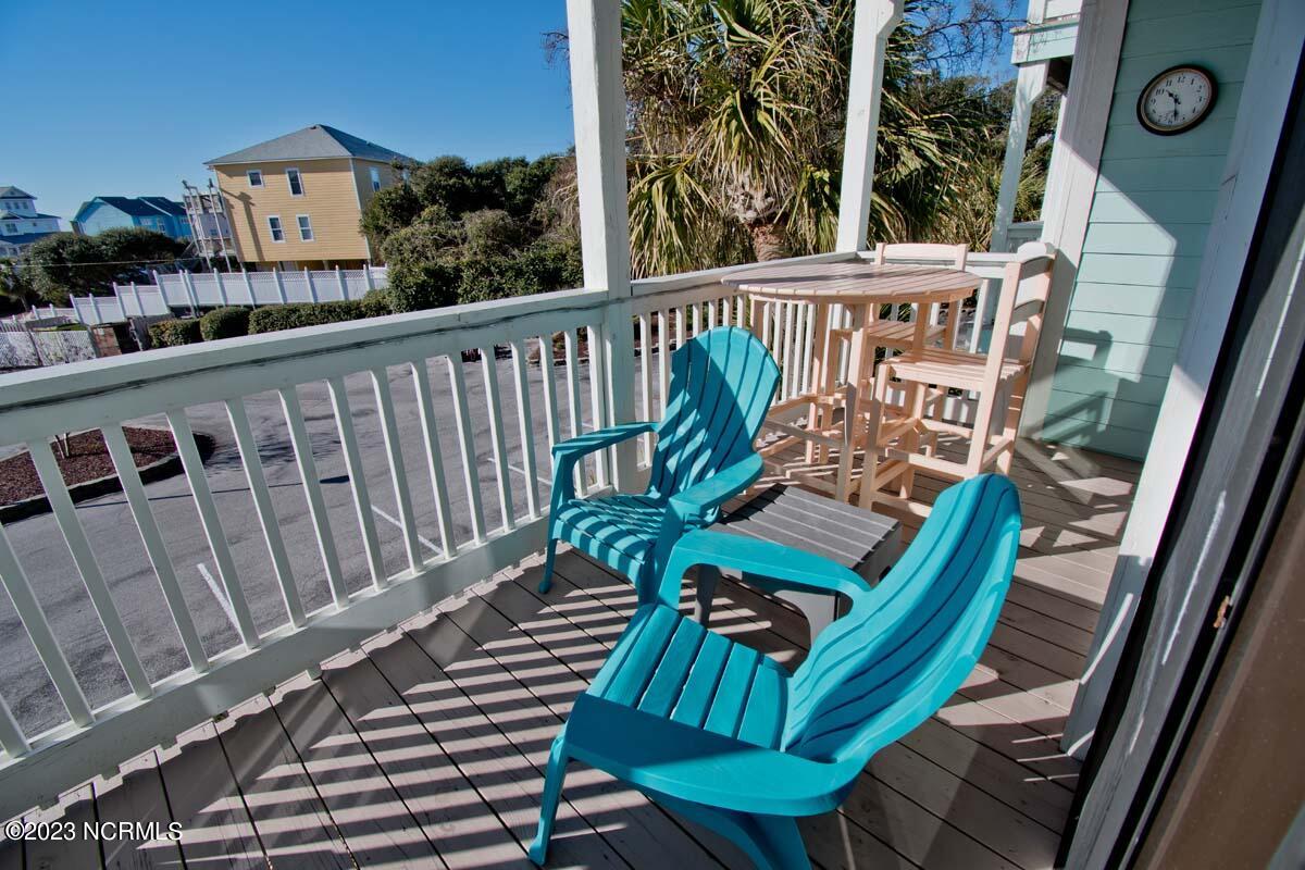 9201 Coast Guard Road, Unit B203 Emerald Isle, NC 28594 - Photo 23 of 37 living/bedroom deck