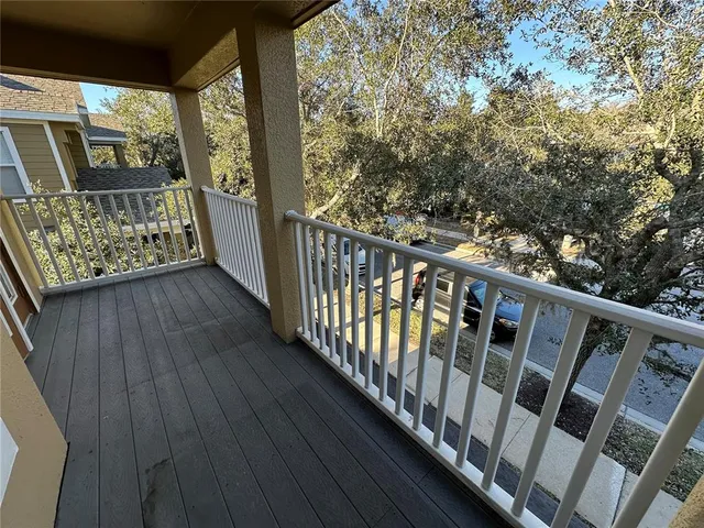 a bathroom with a tub sink and a mirror