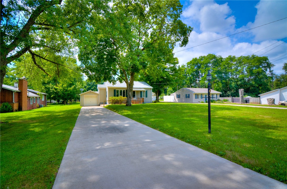 63 Grays Lane Decatur, IL 62526 - Photo 4 of 28 a view of yard with swimming pool and green space