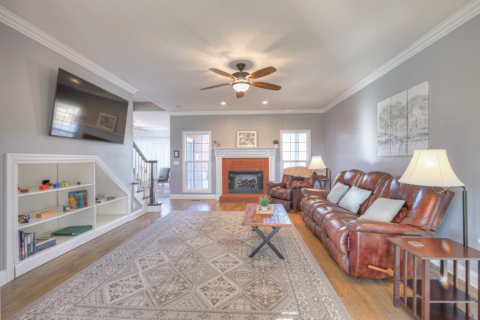 5784 Rock Springs Road Smyrna, TN 37167 - Photo 40 of 74 a living room with furniture and a flat screen tv
