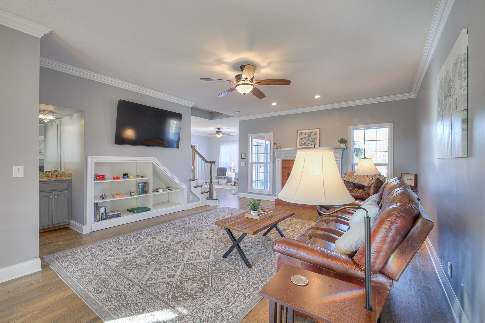 5784 Rock Springs Road Smyrna, TN 37167 - Photo 41 of 74 a living room with furniture and a flat screen tv
