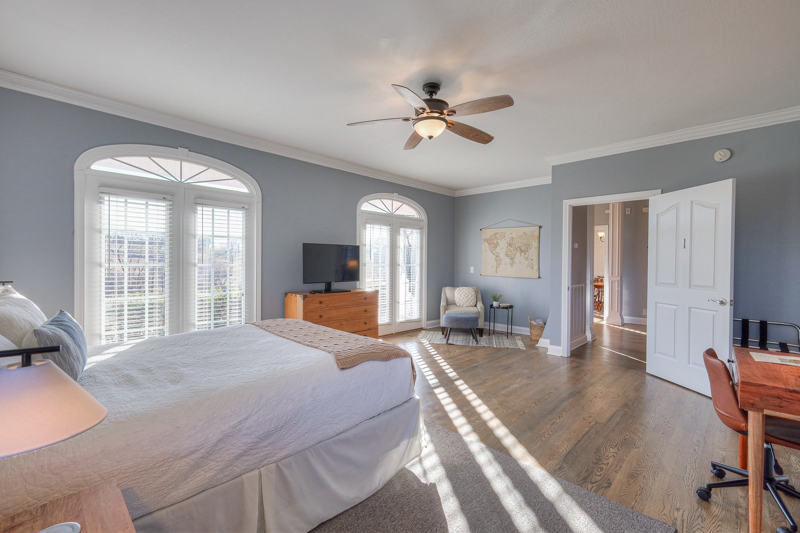 5784 Rock Springs Road Smyrna, TN 37167 - Photo 46 of 74 a spacious bedroom with a large bed a chandelier and windows