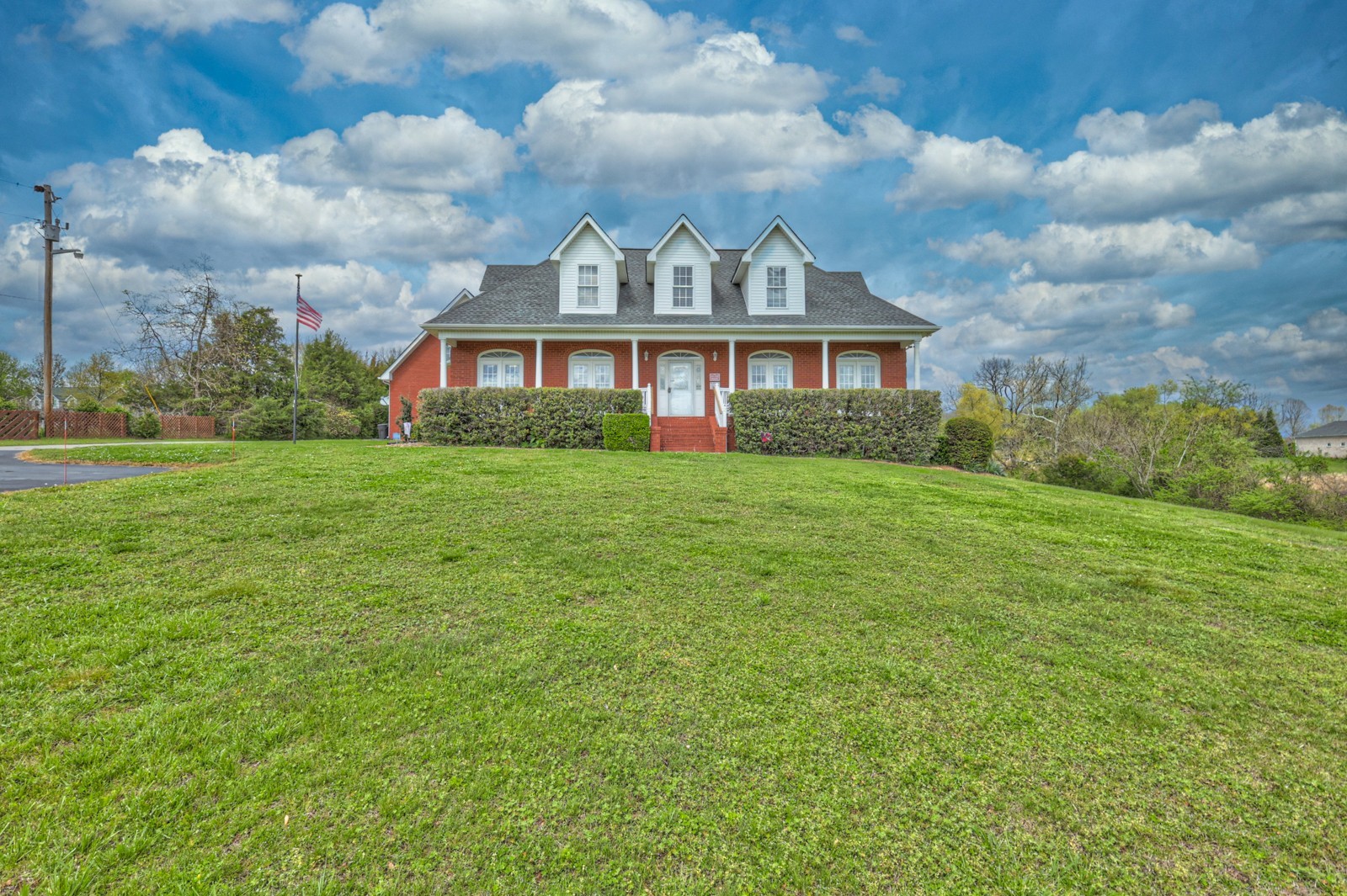 5784 Rock Springs Road Smyrna, TN 37167 - Photo 5 of 74 a view of a big house with a big yard and large trees