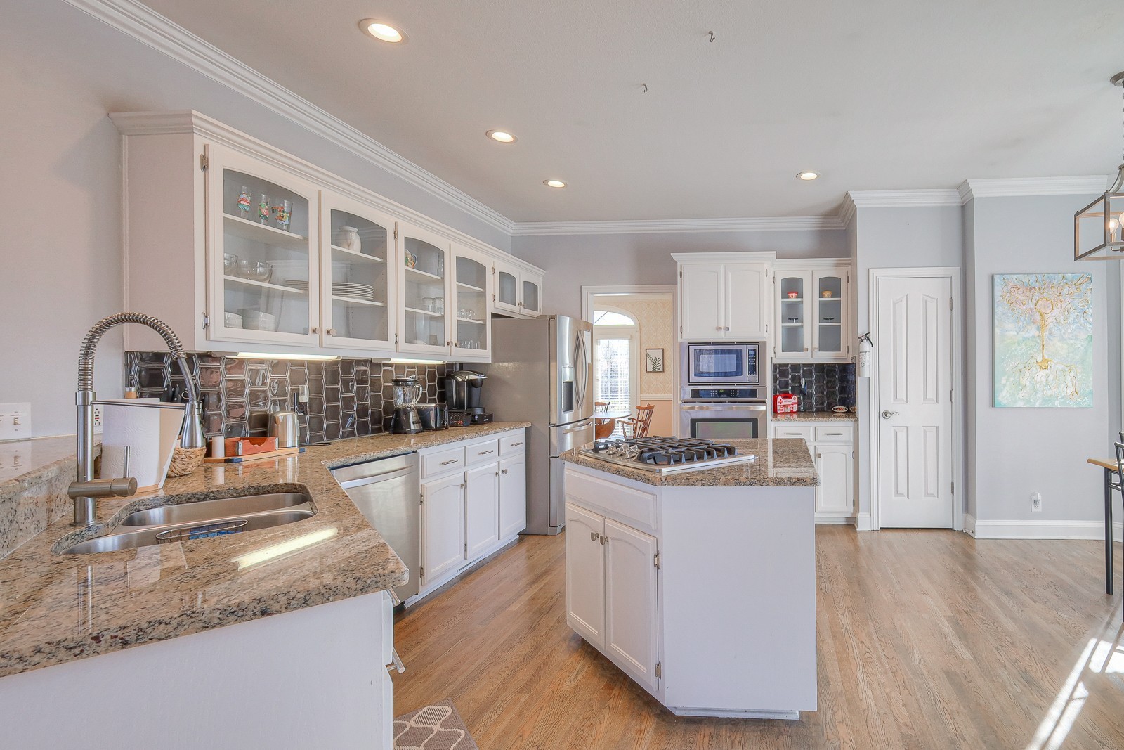 5784 Rock Springs Road Smyrna, TN 37167 - Photo 54 of 74 a kitchen with stainless steel appliances granite countertop a sink stove and refrigerator