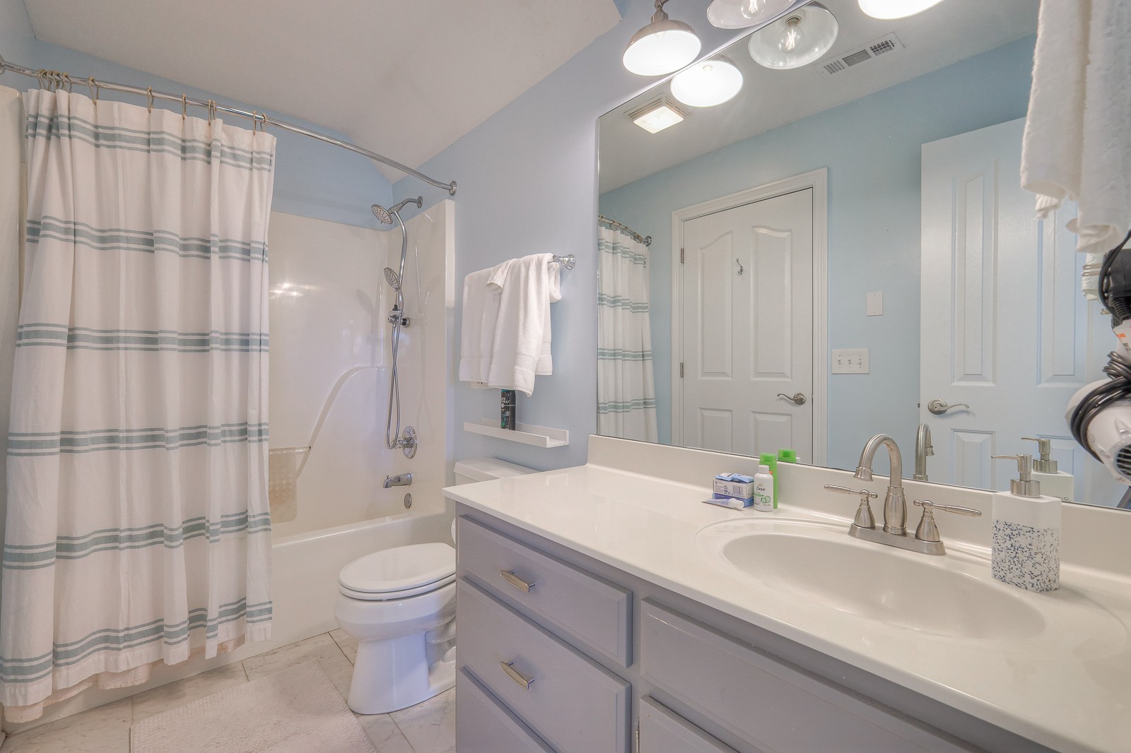 5784 Rock Springs Road Smyrna, TN 37167 - Photo 63 of 74 a bathroom with a double vanity sink toilet mirror and shower