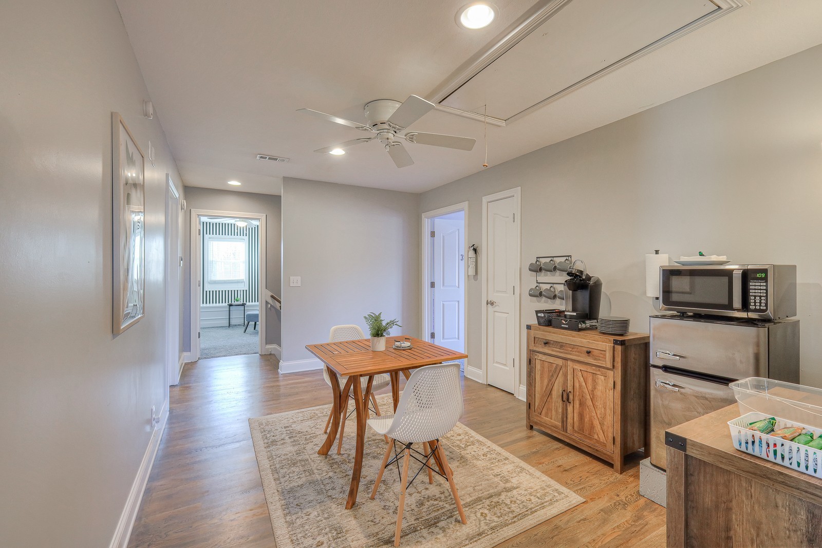 5784 Rock Springs Road Smyrna, TN 37167 - Photo 64 of 74 a open kitchen with stainless steel appliances kitchen island granite countertop a table chairs and a refrigerator