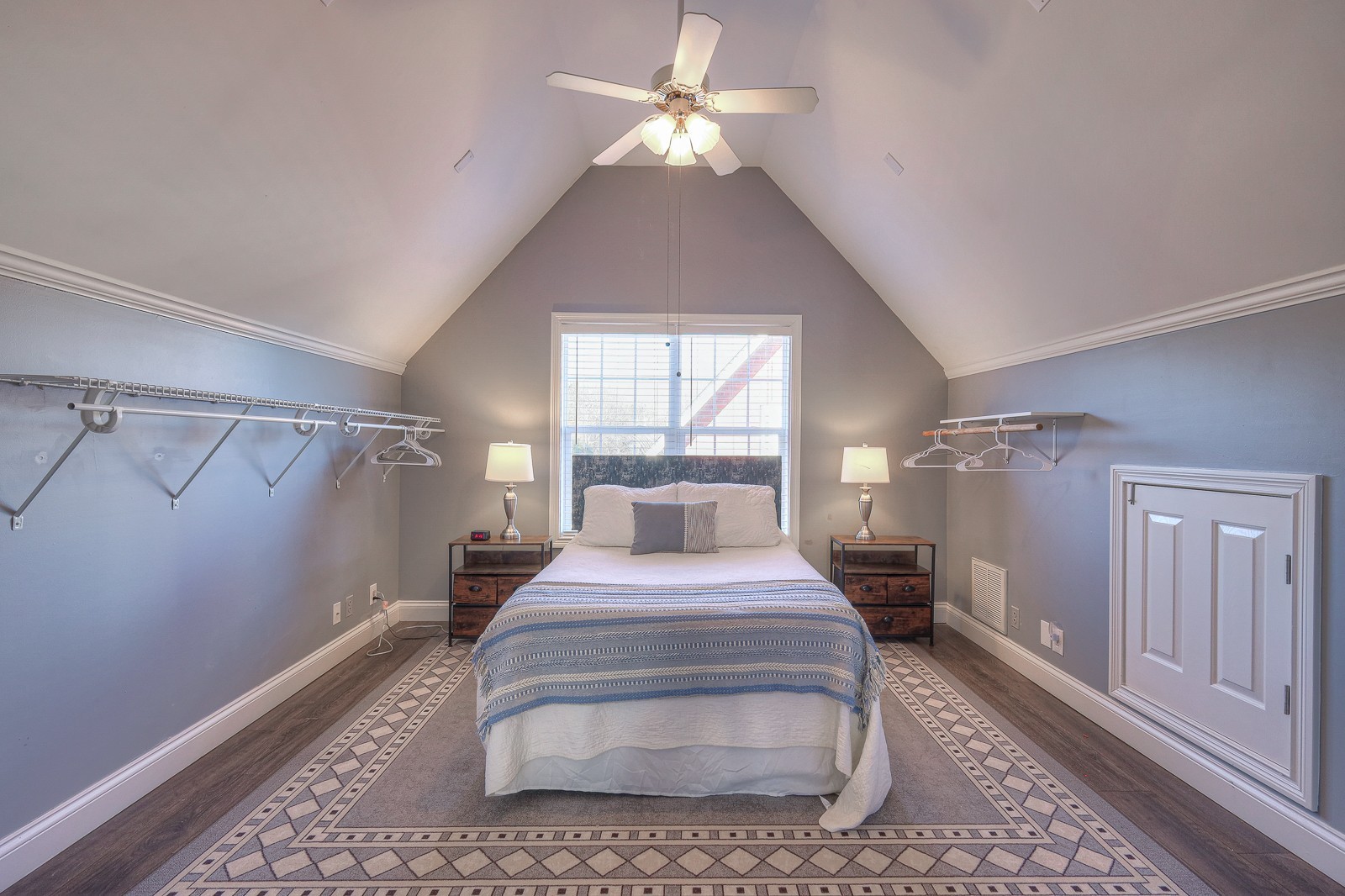 5784 Rock Springs Road Smyrna, TN 37167 - Photo 71 of 74 a large spacious bedroom with a large bed and a chandelier