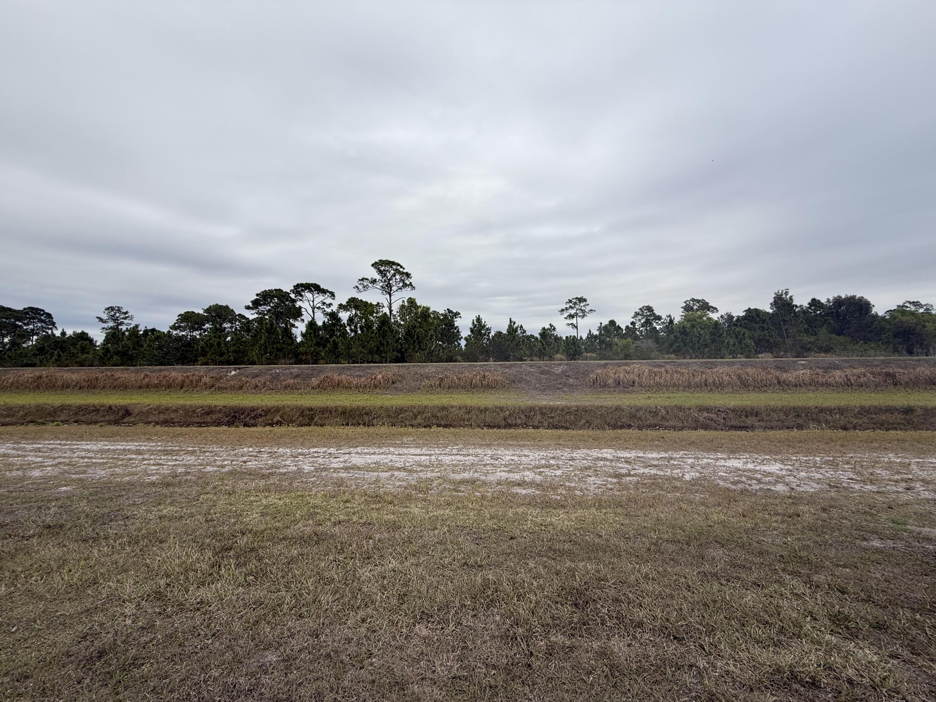 754 Hunting Club Avenue Clewiston, FL 33440 - Photo 24 of 31 a view of a lake