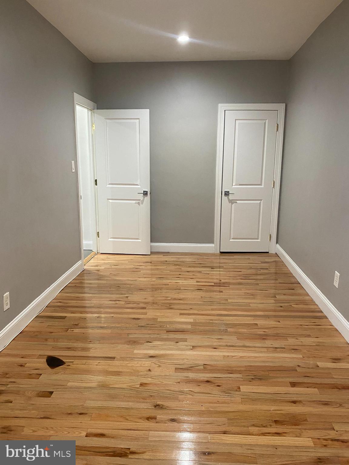 1122 Penn Street Northeast, Unit 1 Washington, DC 20002 - Photo 23 of 31 a view of empty room with wooden floor