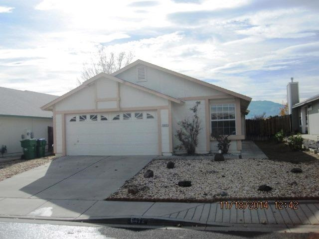 6472 Chesterfield Lane Reno, NV 89523 - Photo 1 of 1 a view of a house with a sink and a yard