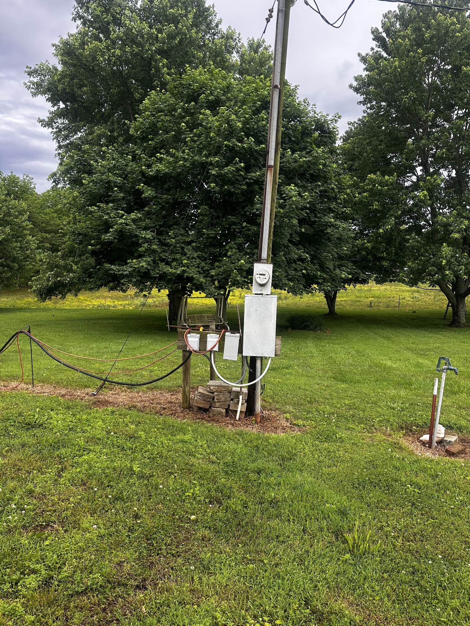 1142 Maxwell Road Belvidere, TN 37306 - Photo 27 of 29 a view of a ocean with a bench and trees