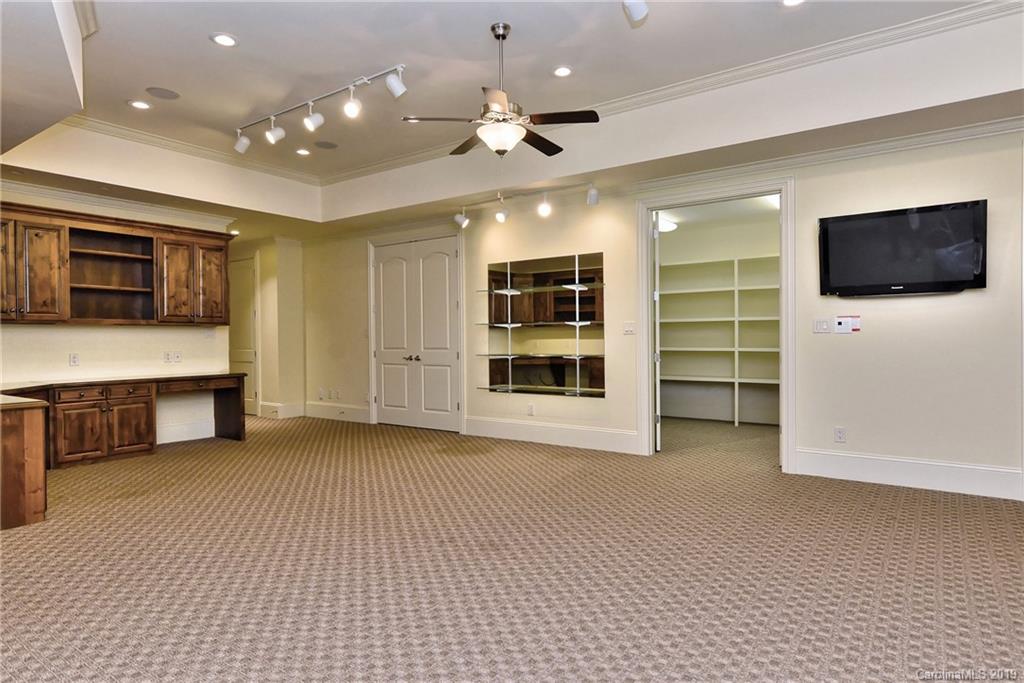 17415 Cabarrus Road Midland, NC 28107 - Photo 29 of 41 a view of a livingroom with furniture and a flat screen tv