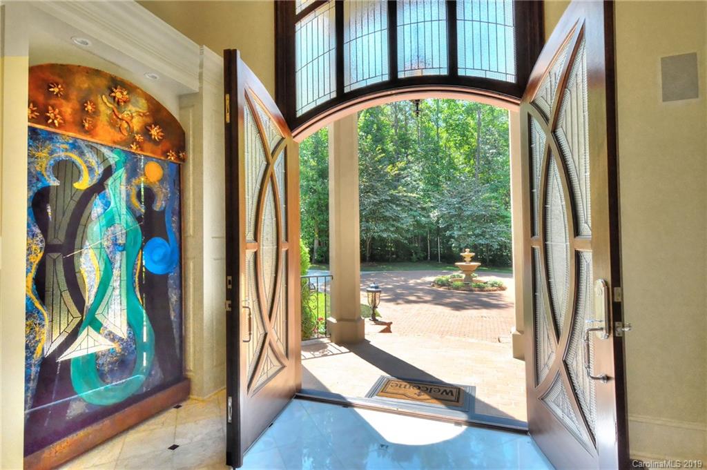 17415 Cabarrus Road Midland, NC 28107 - Photo 4 of 41 a view of an entryway with wooden floor and door