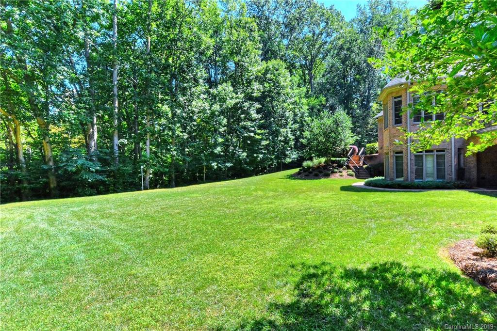 17415 Cabarrus Road Midland, NC 28107 - Photo 40 of 41 a view of a backyard with a garden