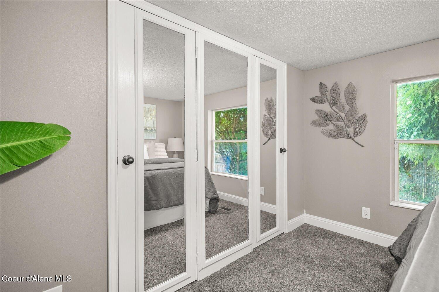 9090 North Runkle Road Hayden, ID 83835 - Photo 20 of 40 Handy mirrored closet doors!