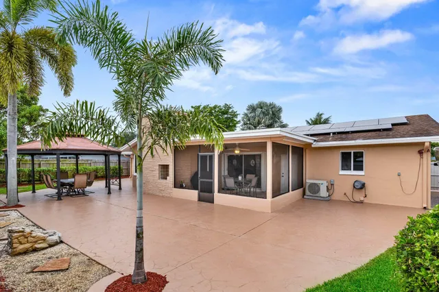 front view of a house with a patio
