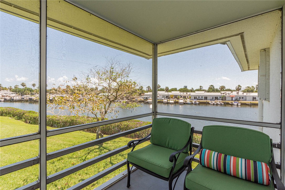 2800 Indian River Boulevard, Unit G6 Vero Beach, FL 32960 - Photo 15 of 22 a balcony with furniture and a window