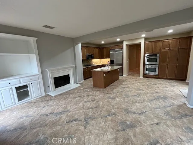 a view of a livingroom with a fireplace