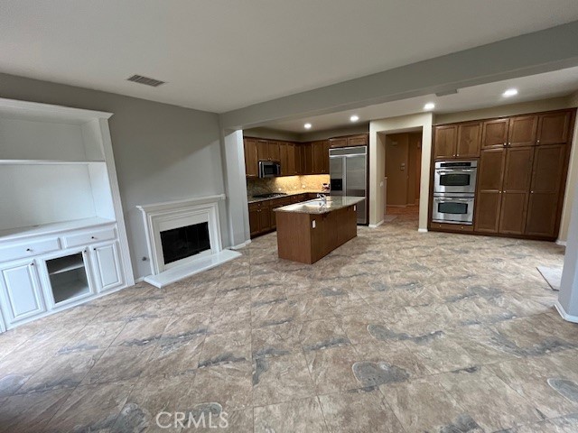13 Yorkshire Court Laguna Niguel, CA 92677 - Photo 11 of 21 a view of a livingroom with a fireplace