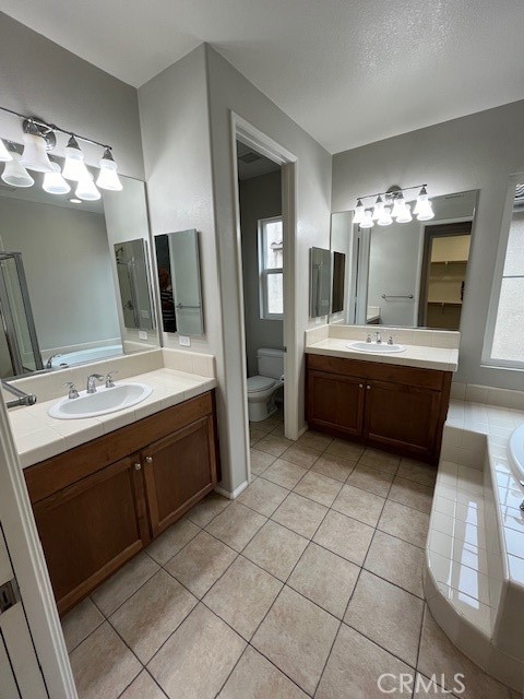 13 Yorkshire Court Laguna Niguel, CA 92677 - Photo 12 of 21 a bathroom with a sink double vanity granite and a mirror
