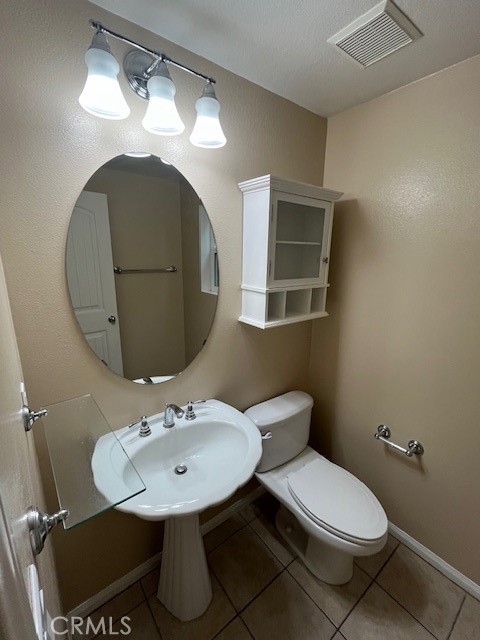 13 Yorkshire Court Laguna Niguel, CA 92677 - Photo 6 of 21 a bathroom with a sink toilet and a mirror