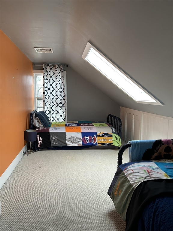 32 Parker Street, Unit 1 Lexington, MA 02421 - Photo 16 of 20 a bedroom with bed and window
