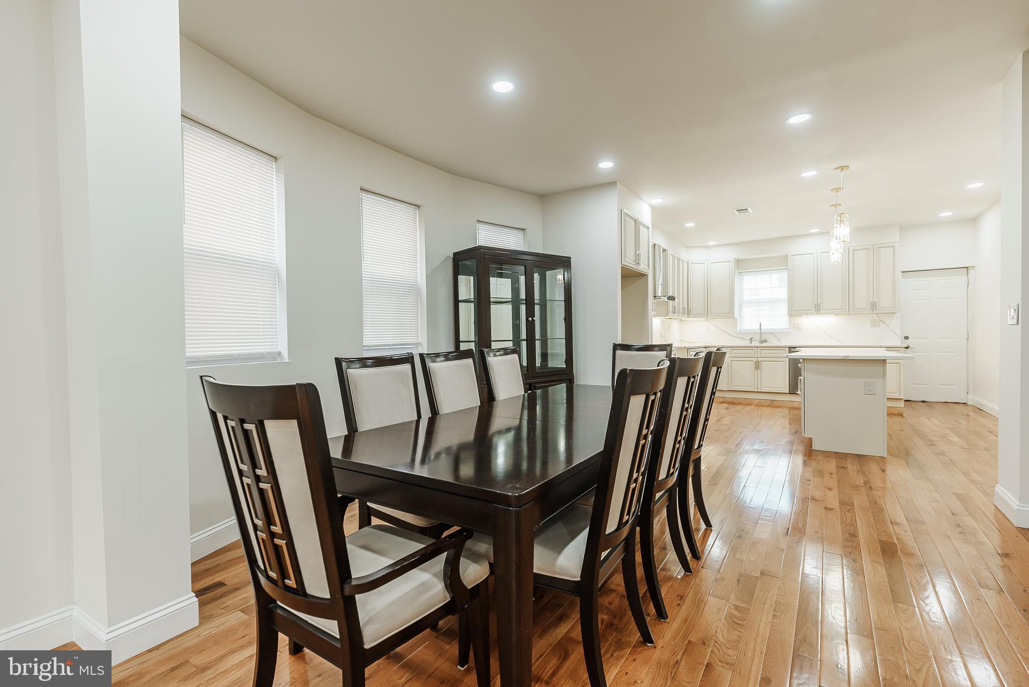 6357 Old York Road Philadelphia, PA 19141 - Photo 12 of 41 a view of a dining room with furniture and a chandelier