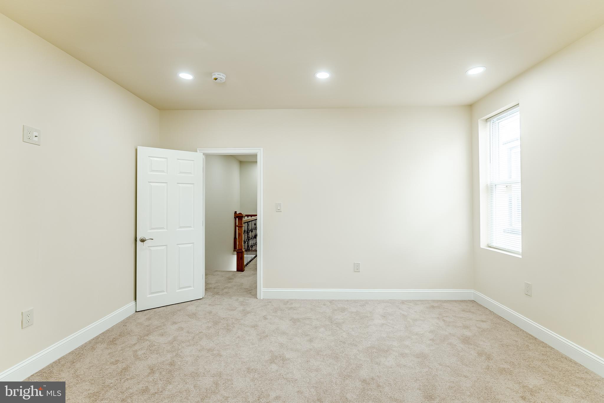 6357 Old York Road Philadelphia, PA 19141 - Photo 21 of 41 an empty room with windows and closet