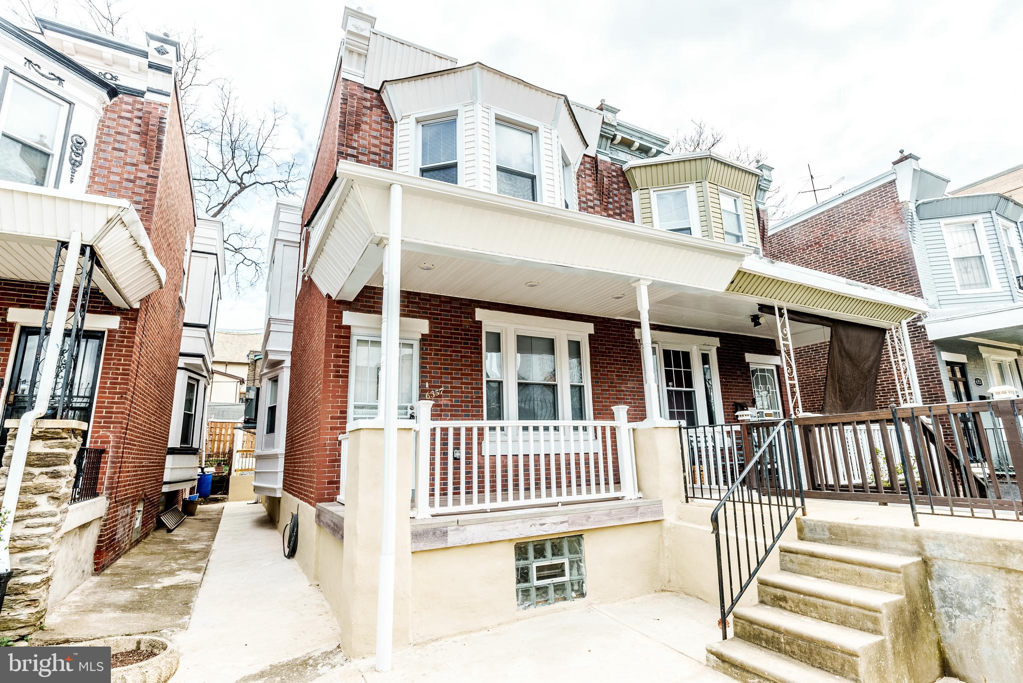 6357 Old York Road Philadelphia, PA 19141 - Photo 33 of 41 a front view of a house with a porch