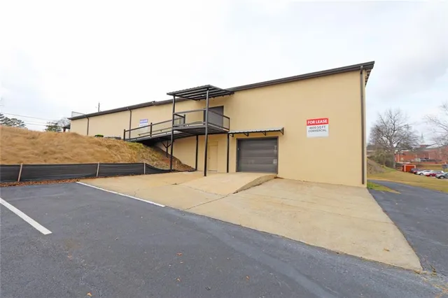 a house with trees in the background
