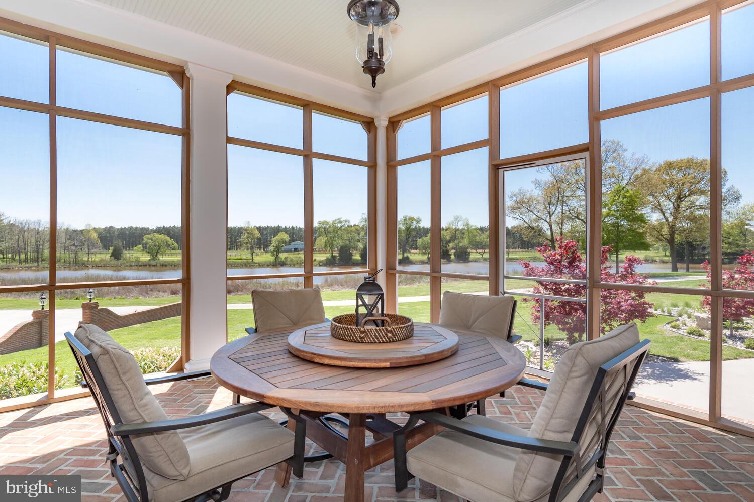 28589 Brick Row Drive Oxford, MD 21654 - Photo 38 of 129 Wrap around waterside porch