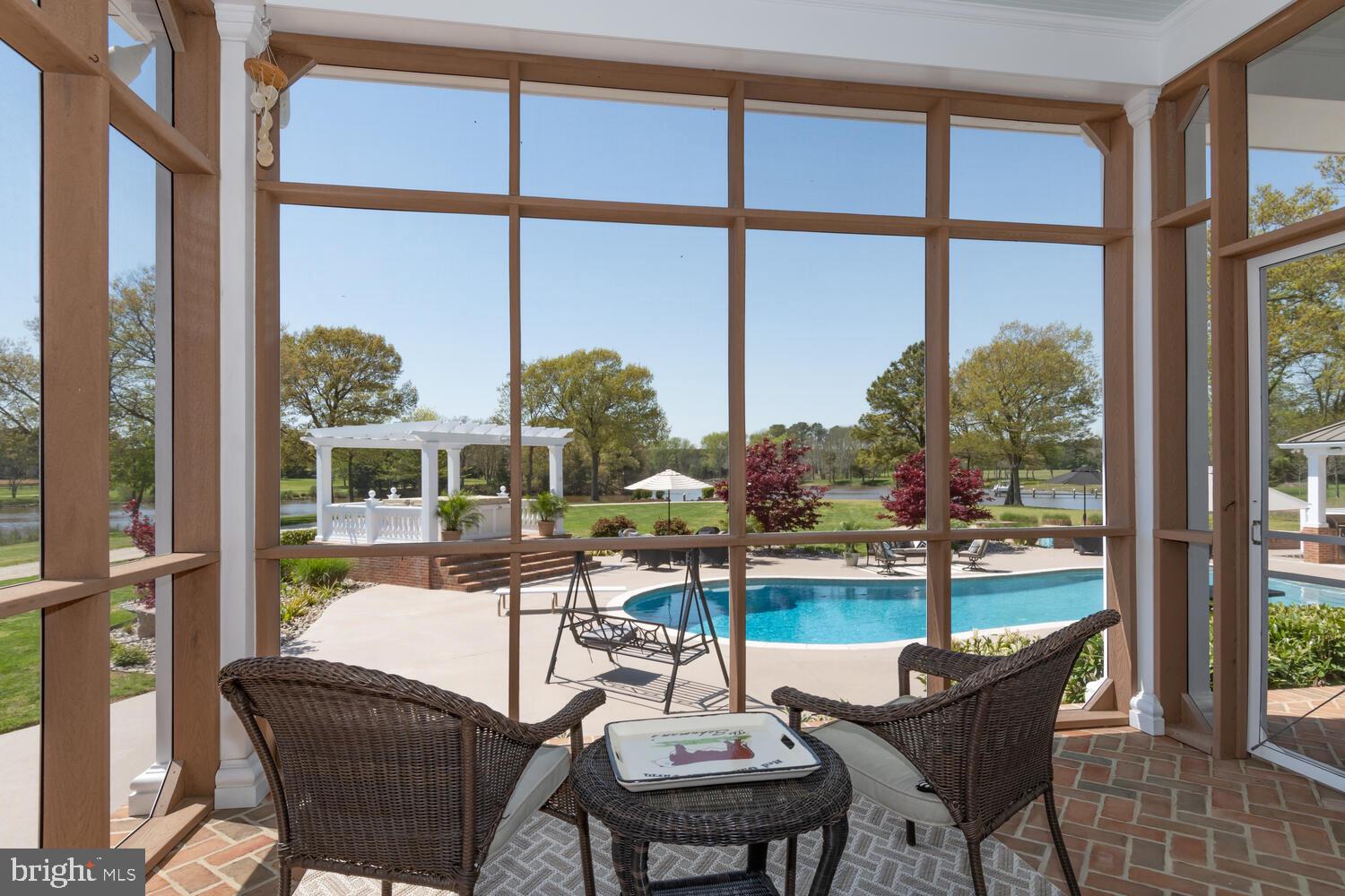 28589 Brick Row Drive Oxford, MD 21654 - Photo 39 of 129 Wrap around waterside porch