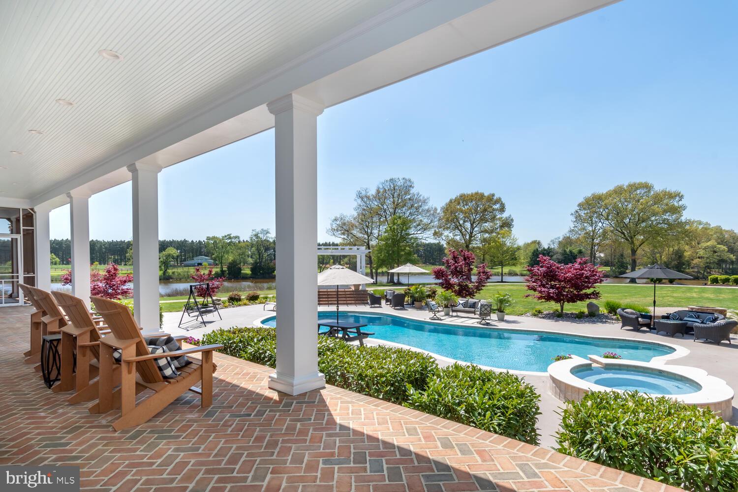 28589 Brick Row Drive Oxford, MD 21654 - Photo 65 of 129 Pool and back porch