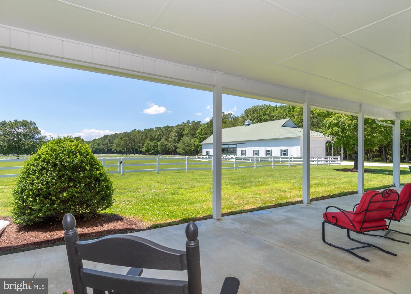 28589 Brick Row Drive Oxford, MD 21654 - Photo 91 of 129 Side porch stable house