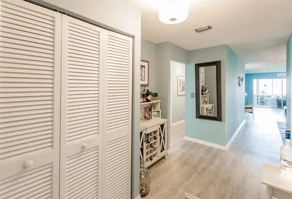 a view of a entryway with wooden floor
