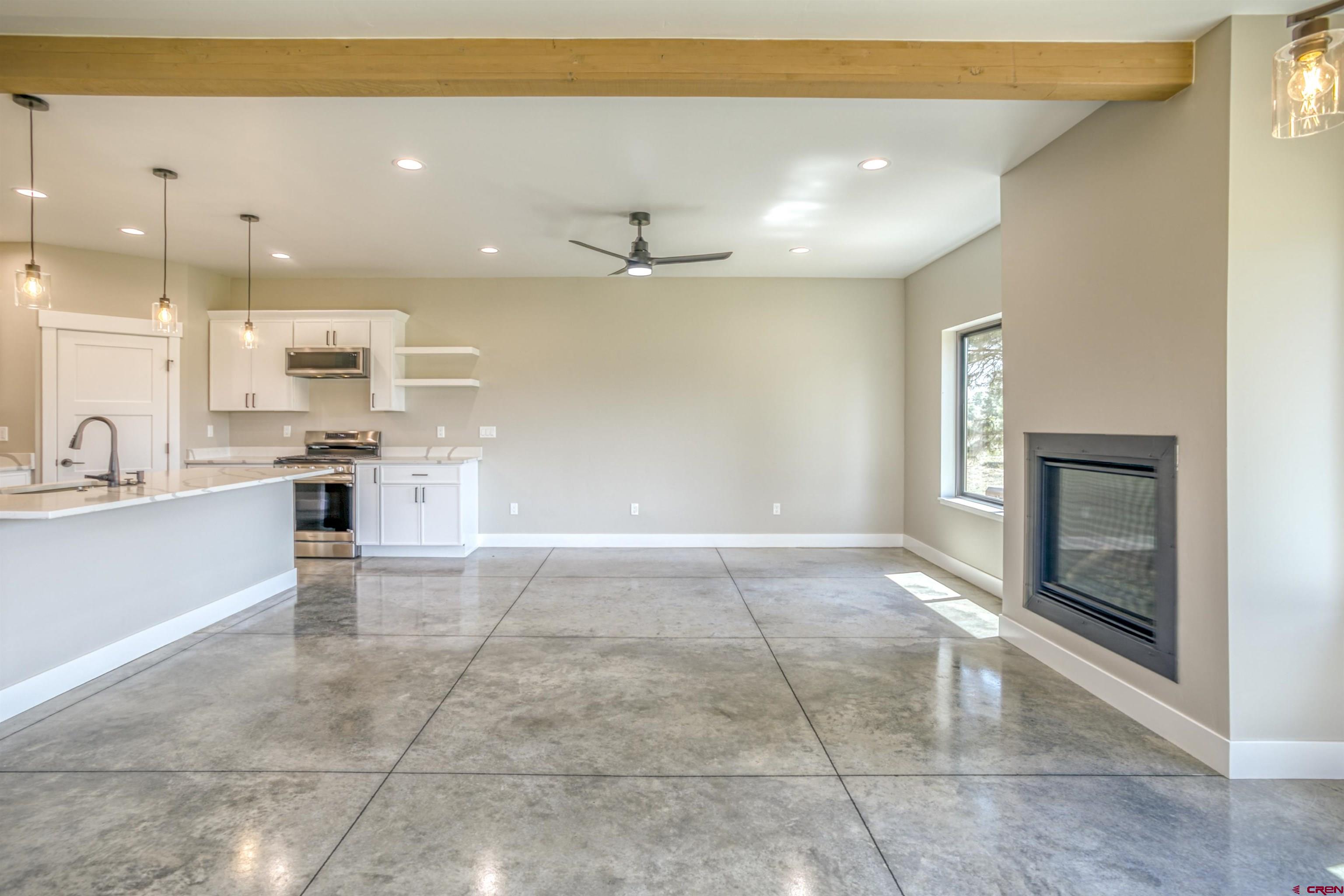 2790 Rock Road, Unit C Pagosa Springs, CO 81147 - Photo 24 of 44 a view of a kitchen with a sink and a stove top oven