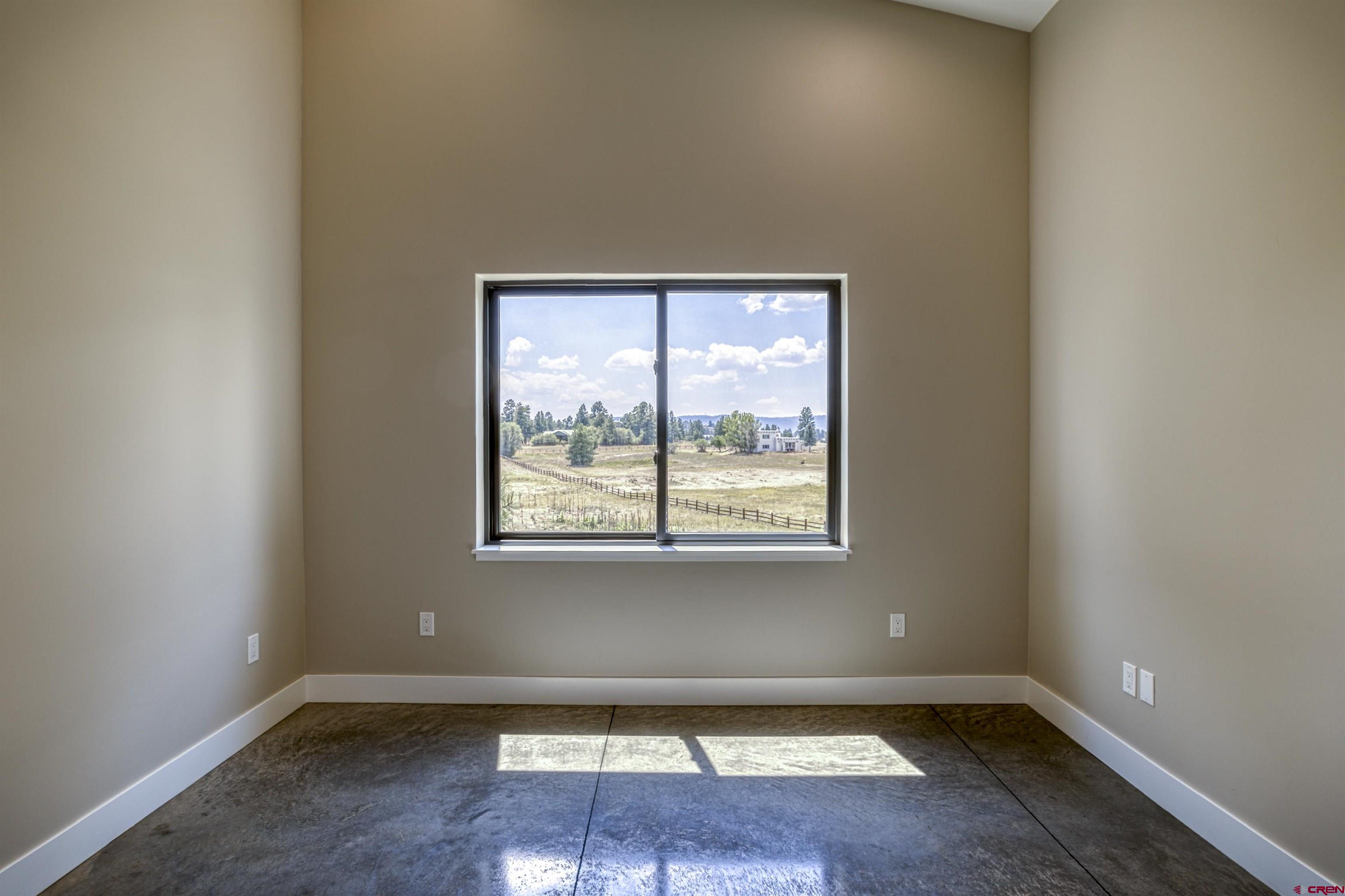 2790 Rock Road, Unit C Pagosa Springs, CO 81147 - Photo 36 of 44 an empty room with a window