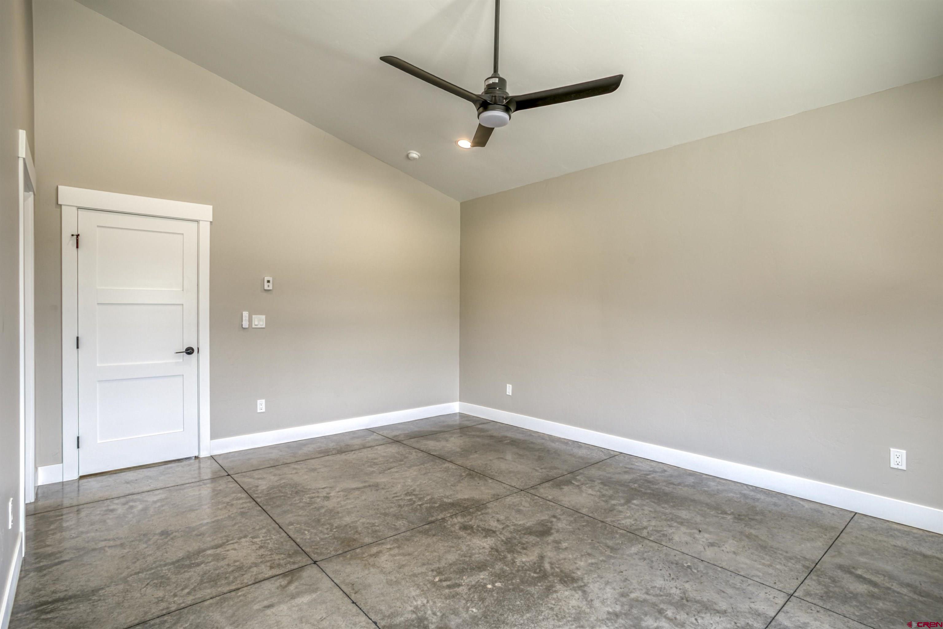 2790 Rock Road, Unit C Pagosa Springs, CO 81147 - Photo 41 of 44 a view of a hallway with a ceiling fan