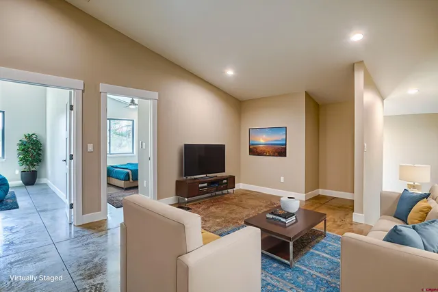 a kitchen with a sink stove and wooden cabinets