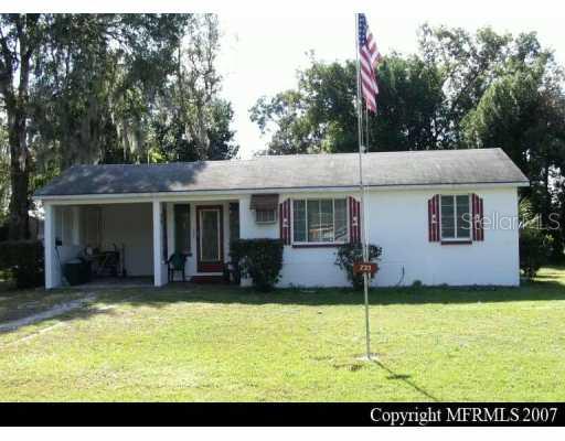 239 Colomba Road DeBary, FL 32713 - Photo 1 of 1 a view of a house with a yard patio and fire pit