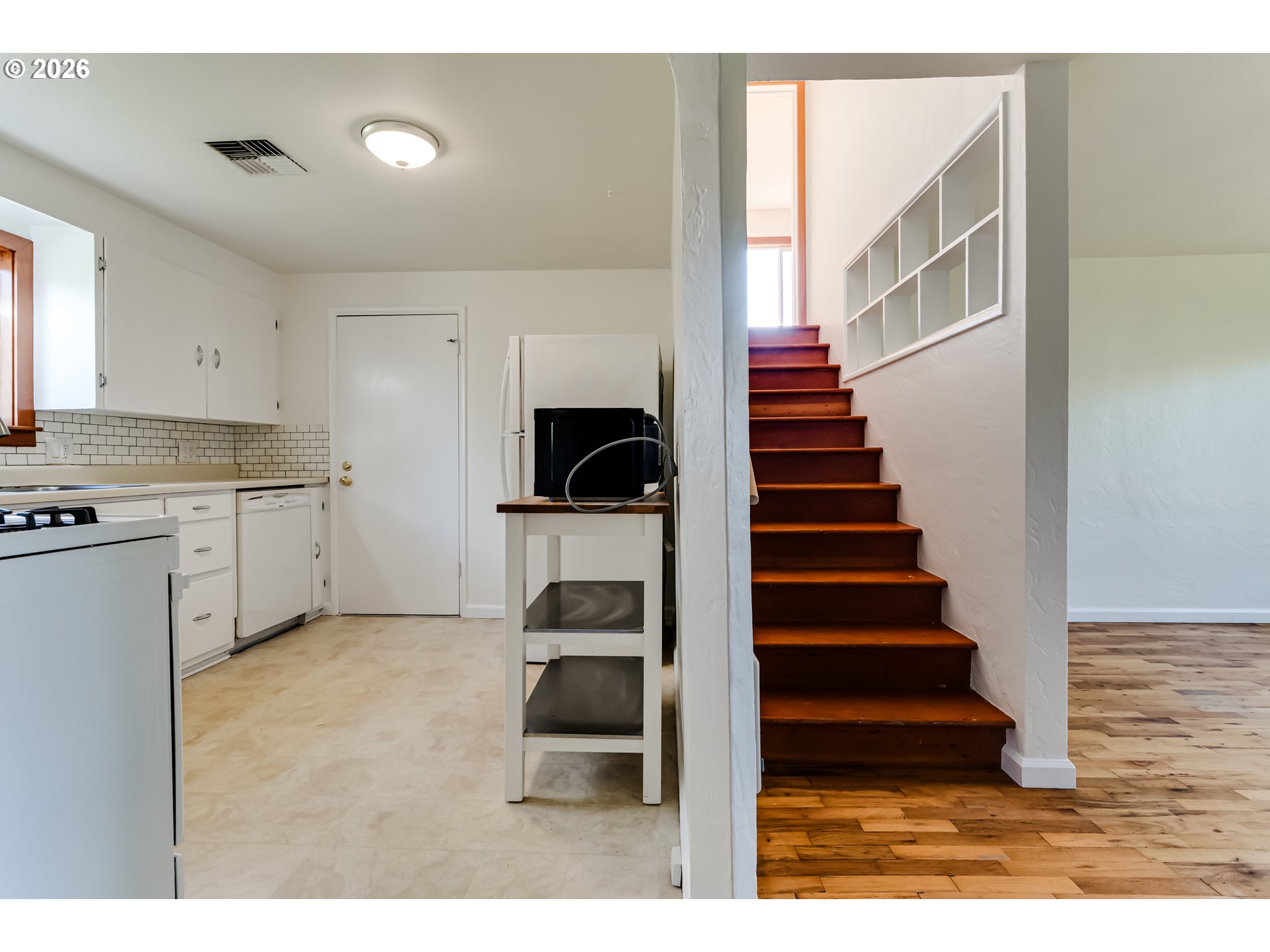 2125 West 19th Place Eugene, OR 97405 - Photo 15 of 29 a view of entryway and hall with wooden floor