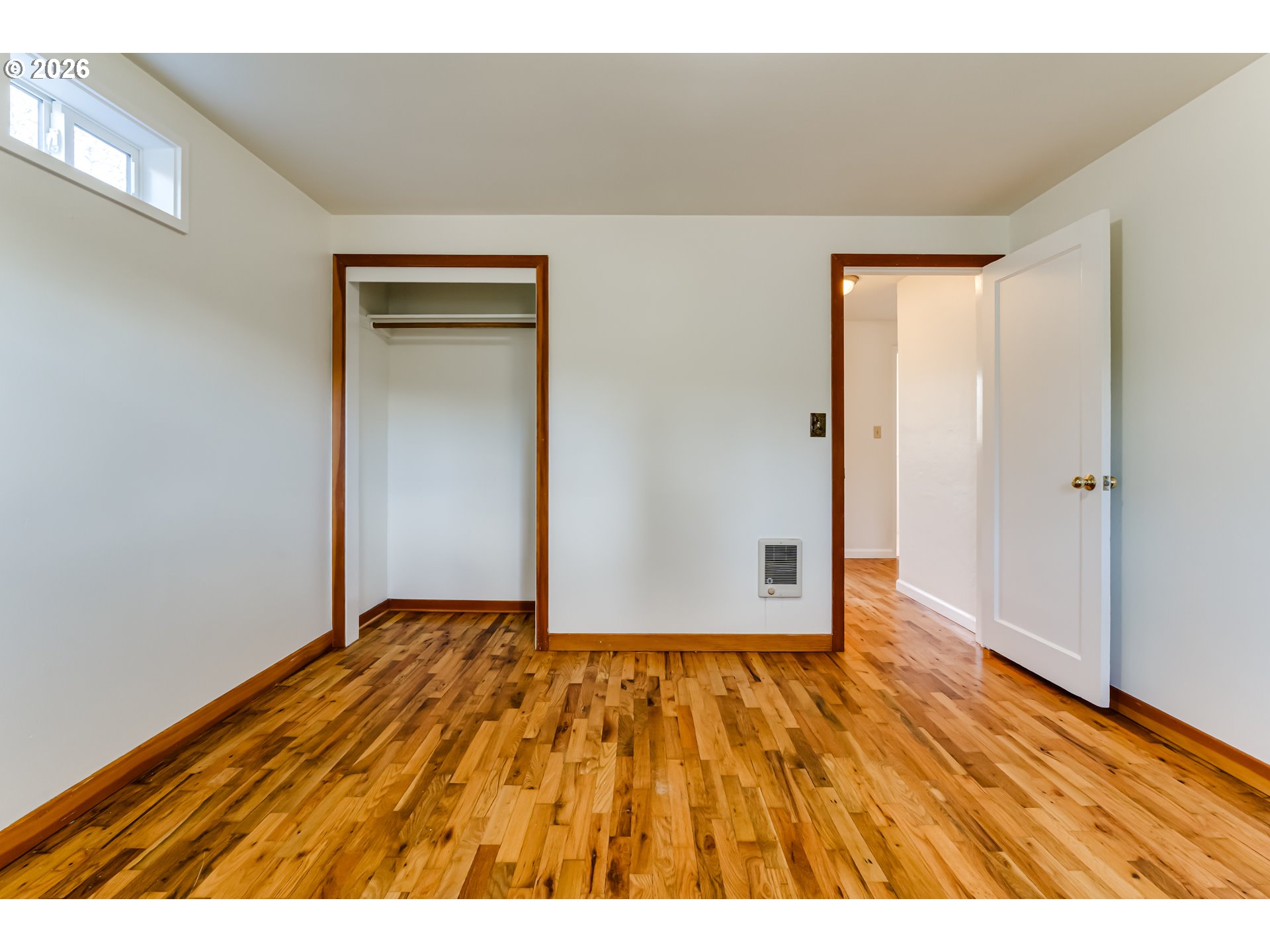 2125 West 19th Place Eugene, OR 97405 - Photo 26 of 29 a view of an empty room with wooden floor