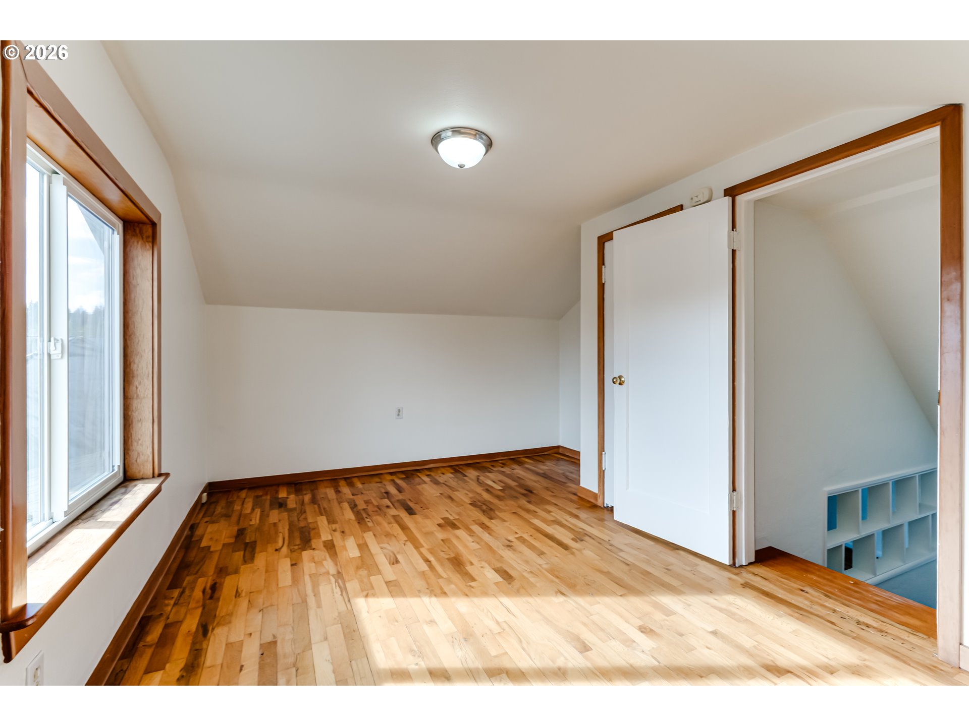 2125 West 19th Place Eugene, OR 97405 - Photo 28 of 29 a view of an empty room and wooden floor