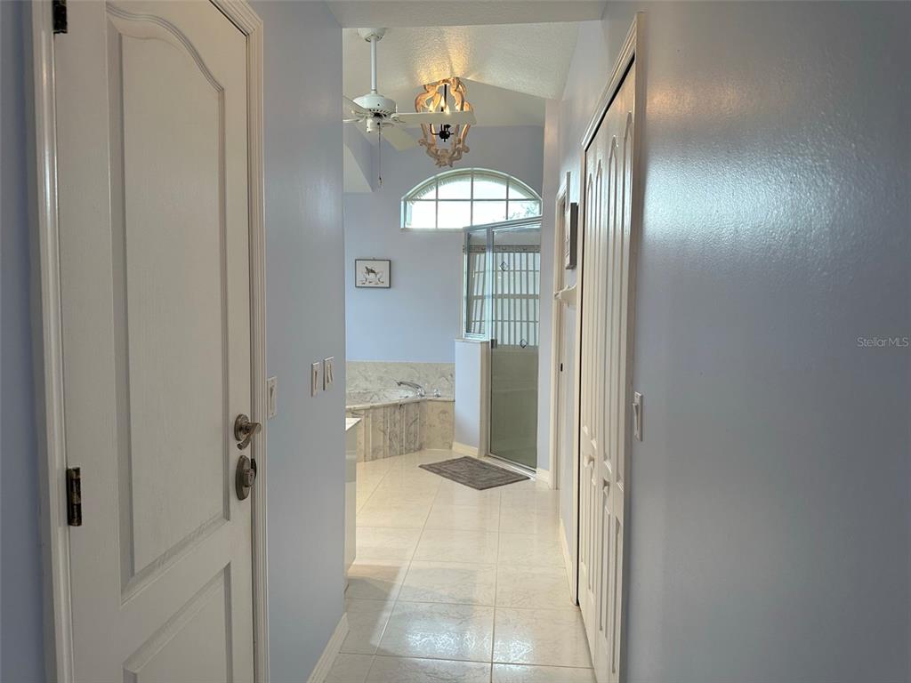 1238 Yorkshire Street Port Charlotte, FL 33952 - Photo 21 of 40 a bathroom with a mirror and a shower