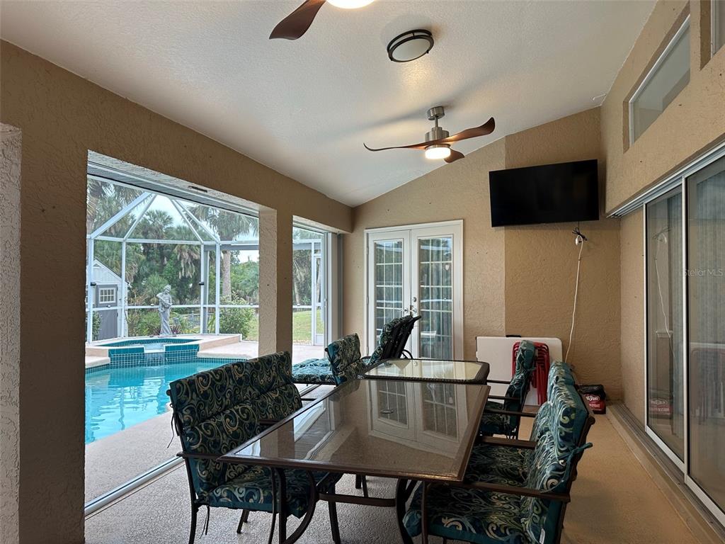 1238 Yorkshire Street Port Charlotte, FL 33952 - Photo 30 of 40 a view of a dining room with furniture window and outside view