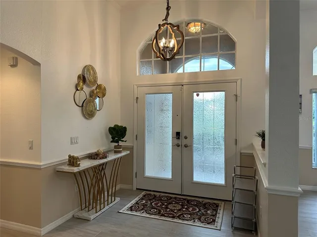 a view of entryway with wooden floor
