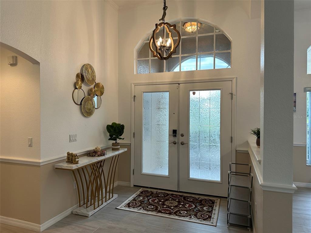1238 Yorkshire Street Port Charlotte, FL 33952 - Photo 5 of 40 a view of entryway with wooden floor