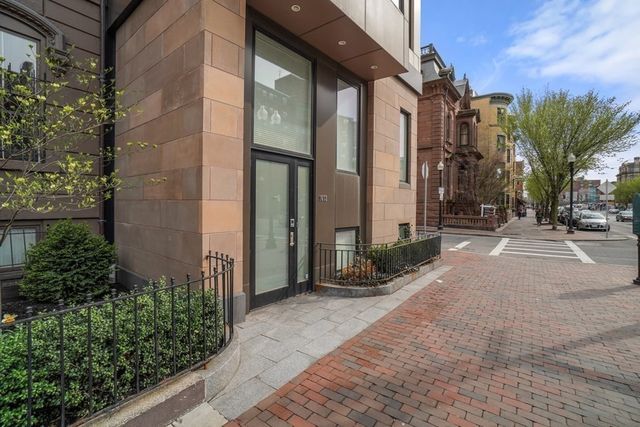 a view of a building along the street