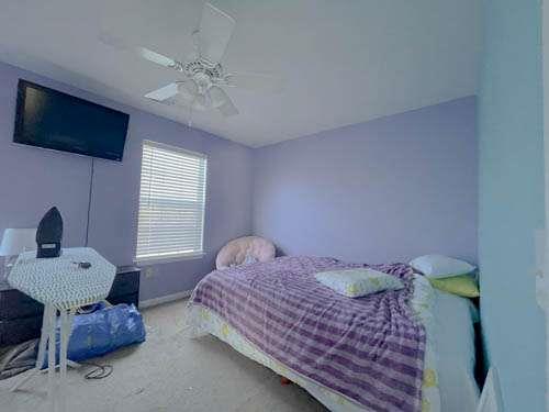147 Benfield Circle Southeast Cartersville, GA 30121 - Photo 14 of 18 a bedroom with a bed and a window